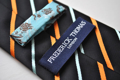 navy with orange and light blue striped tie